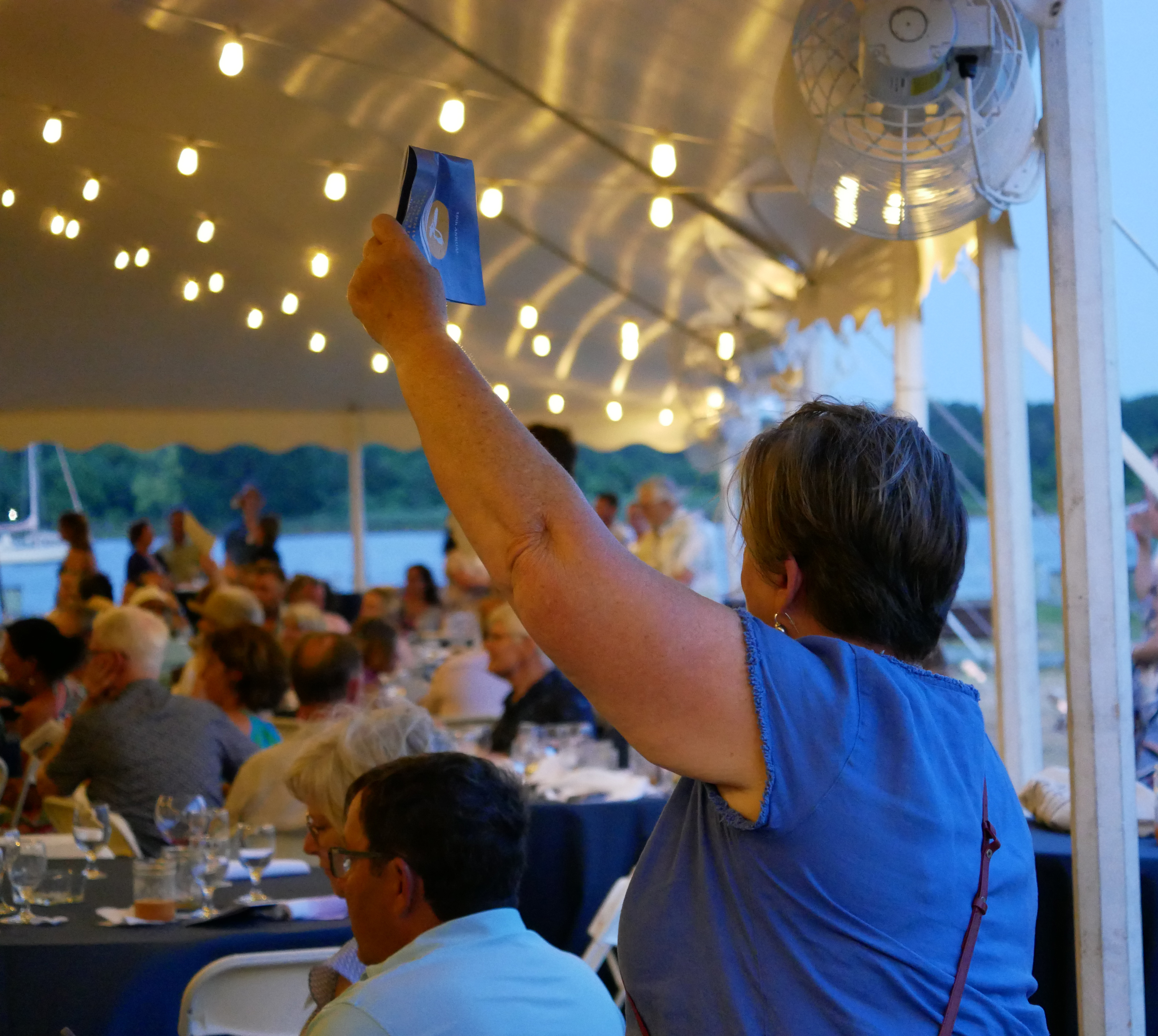 A Guest Places a Bid at ShoreRivers’ Live Auction