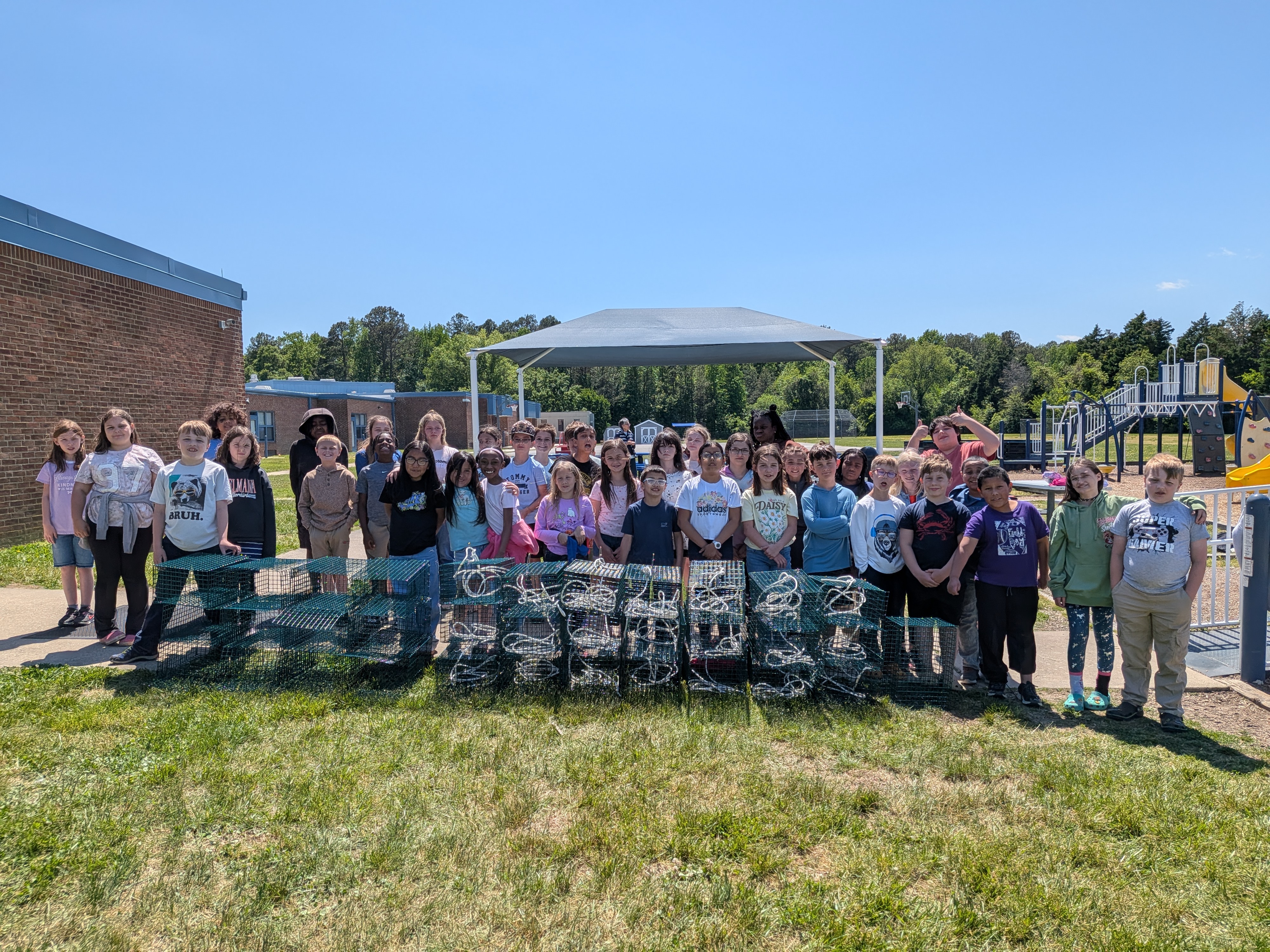 Students at White Marsh Elementary in Trappe show the oyster cages they built as part of a Chesapeake Bay restoration action project with Phillips Wharf Environmental Center. Students at White Marsh Elementary in Trappe show the oyster cages they built as part of a Chesapeake Bay restoration action project with Phillips Wharf Environmental Center.